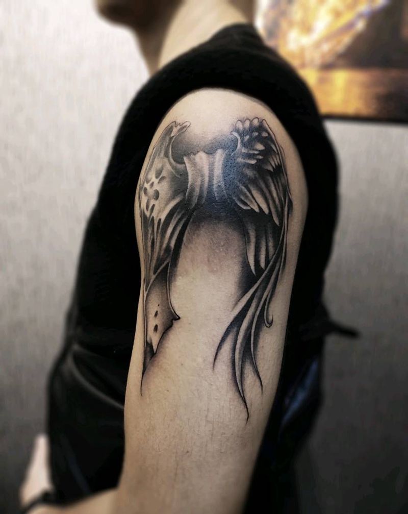 翅膀纹身图片_手臂纹身图案