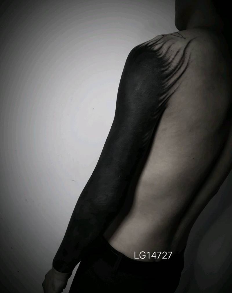 黑臂纹身图片_手臂纹身图案