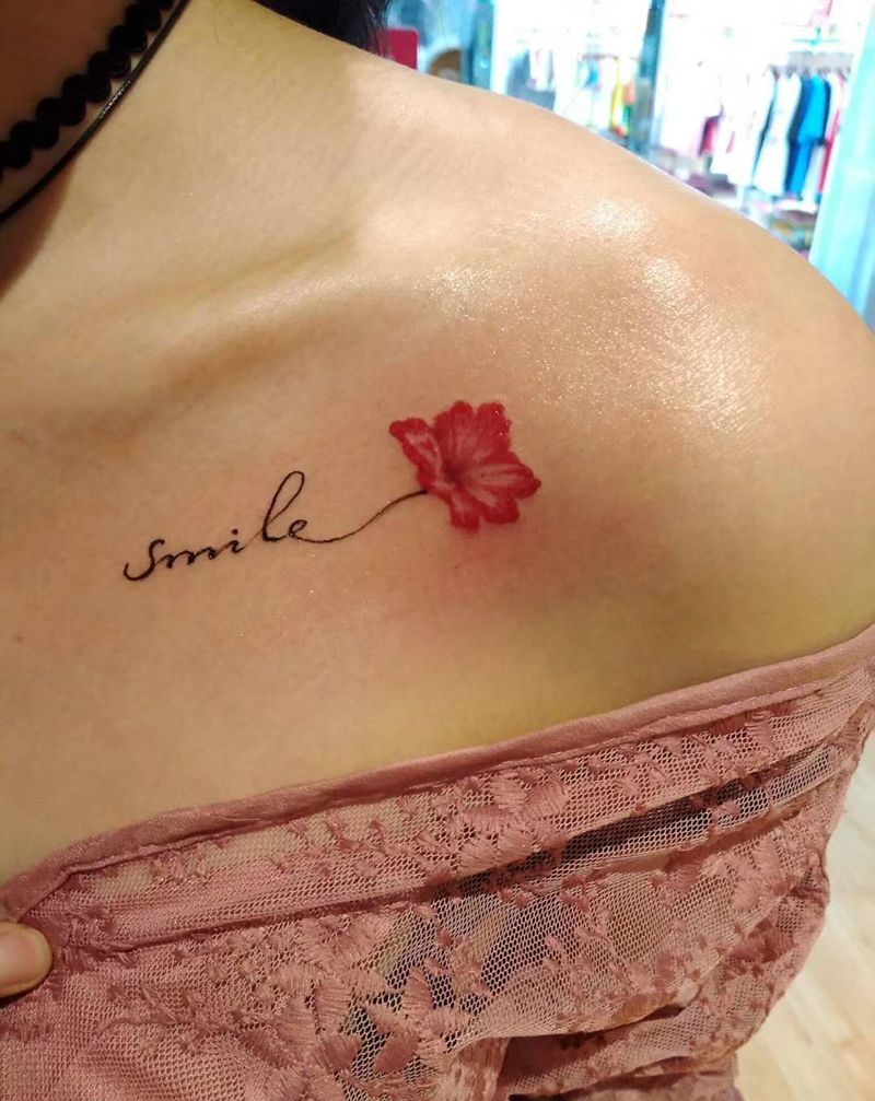 微笑纹身图片_肩部纹身图案