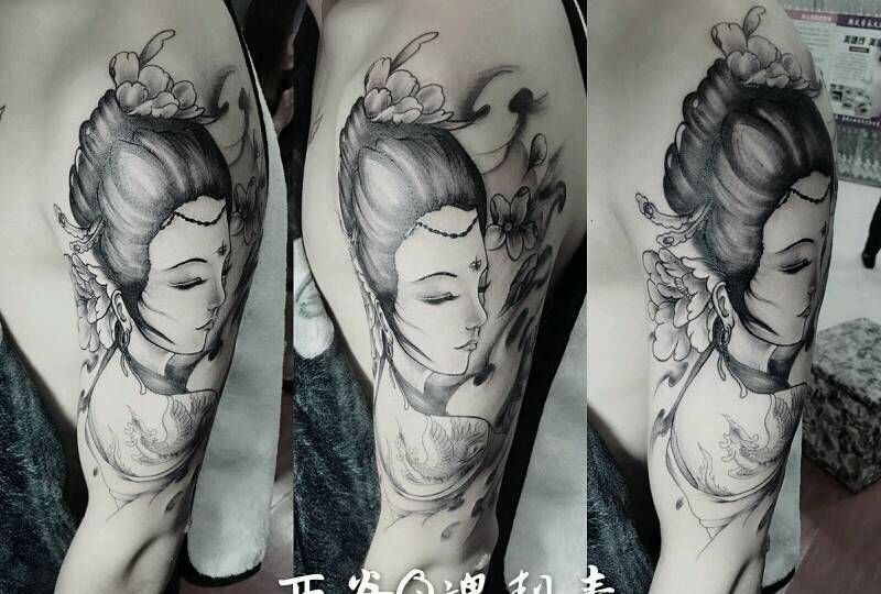 胳膊艺技纹身图片