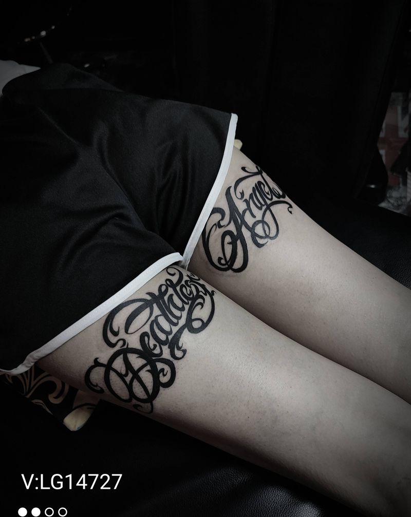 花体字纹身图片_腿部纹身图案