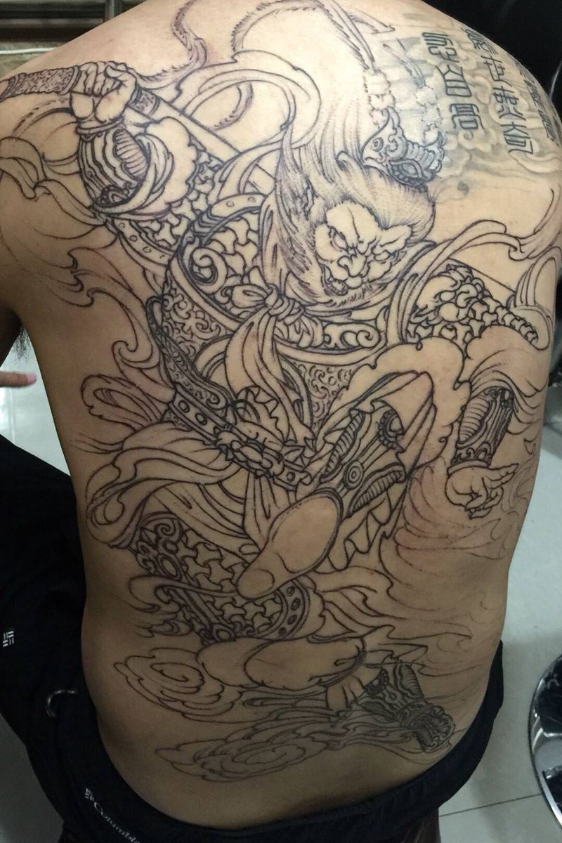 斗战胜佛纹身纹身图片_西安西安刺青人物传统鬼神宗教肖像背部纹身图案