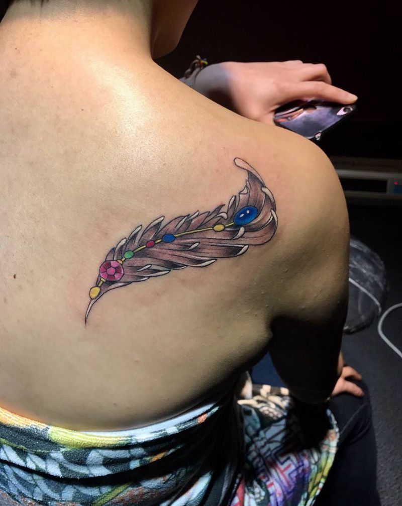 幸运翎毛纹身图片_西安修改清新小英文肖像原创手稿纹身图案