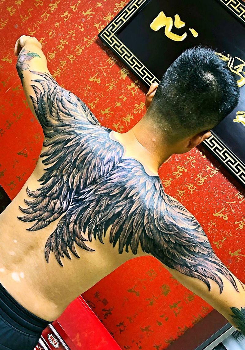 修改失败纹身翅膀纹身图片_西安改西安刺青西安原创欧美肩部成品纹身图案