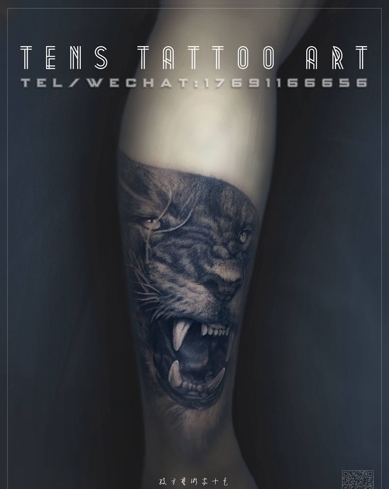 小腿狮子纹身图片_腿部欧美写实纹身图案