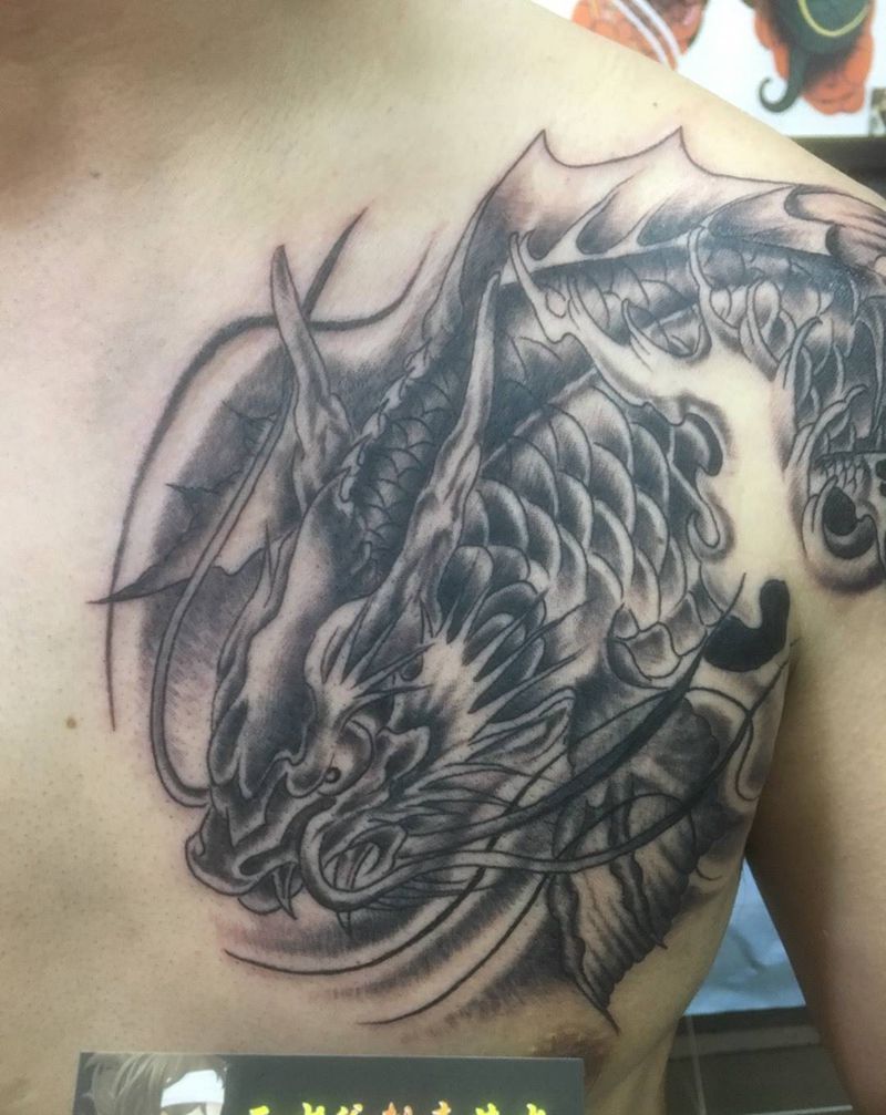 鱼化龙半甲纹身图片