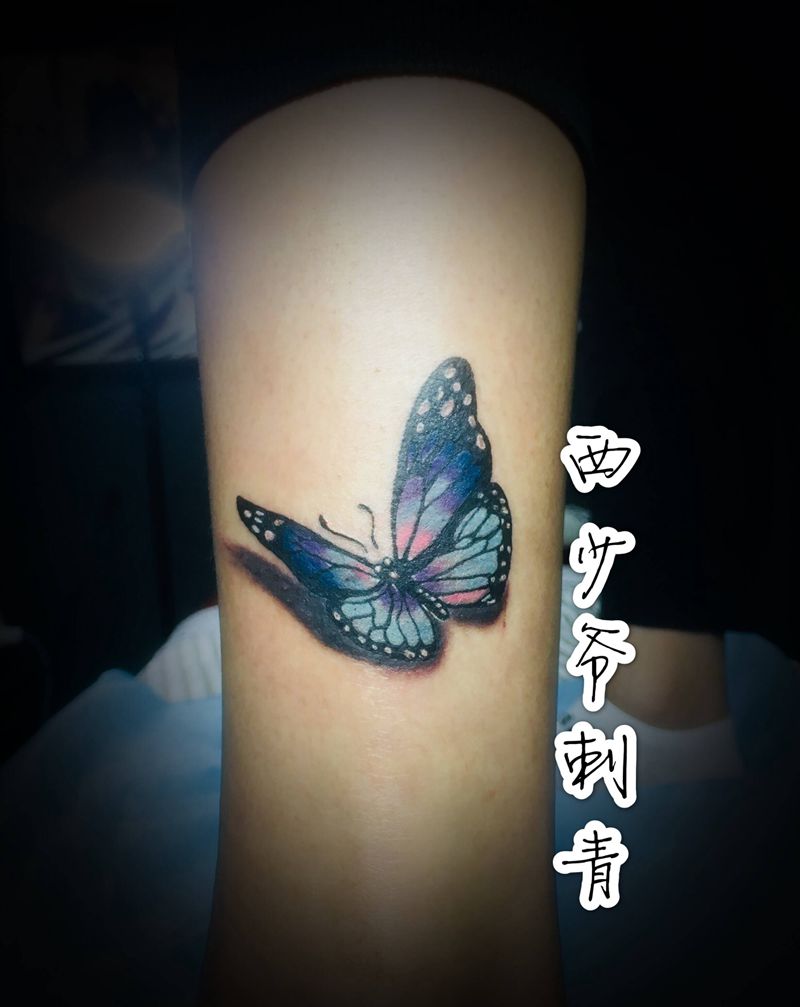 蝴蝶纹身图片_腿部纹身图案