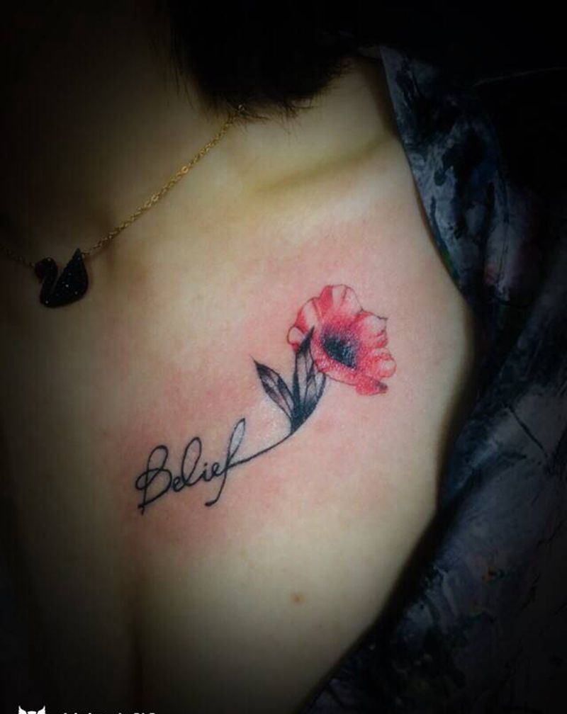 字母花纹身图片_胸部纹身图案