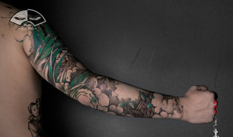 《缕》纹身图片_手臂水墨纹身图案