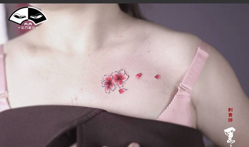 樱花纹身图片_成品肩部颈部手臂传统清新字符植物动物情侣纹身图案