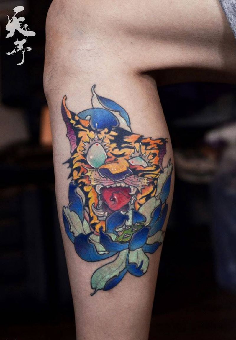 老虎纹身图片_成品腿部欧美动物原创西安老虎school彩色莲花纹身图案