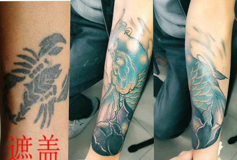 遮盖增生大蝎子纹身图片_手臂纹身图案