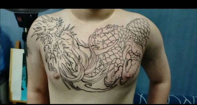 未完成纹身图片_胸部纹身图案