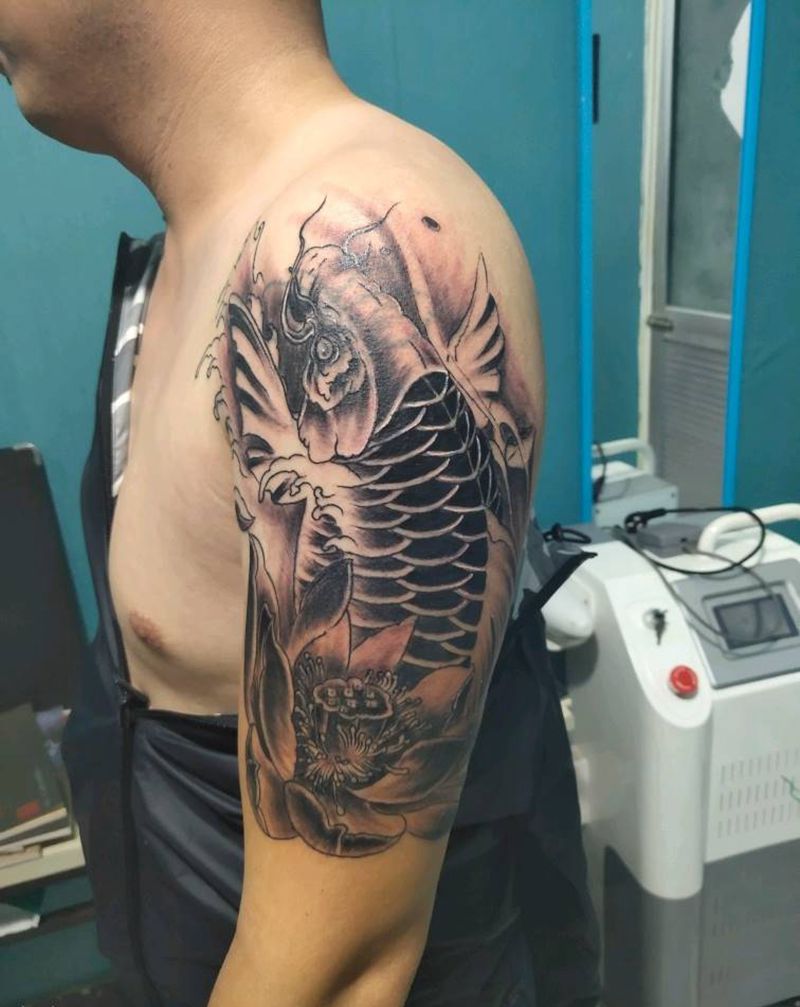 鱼纹身图片_手臂纹身图案