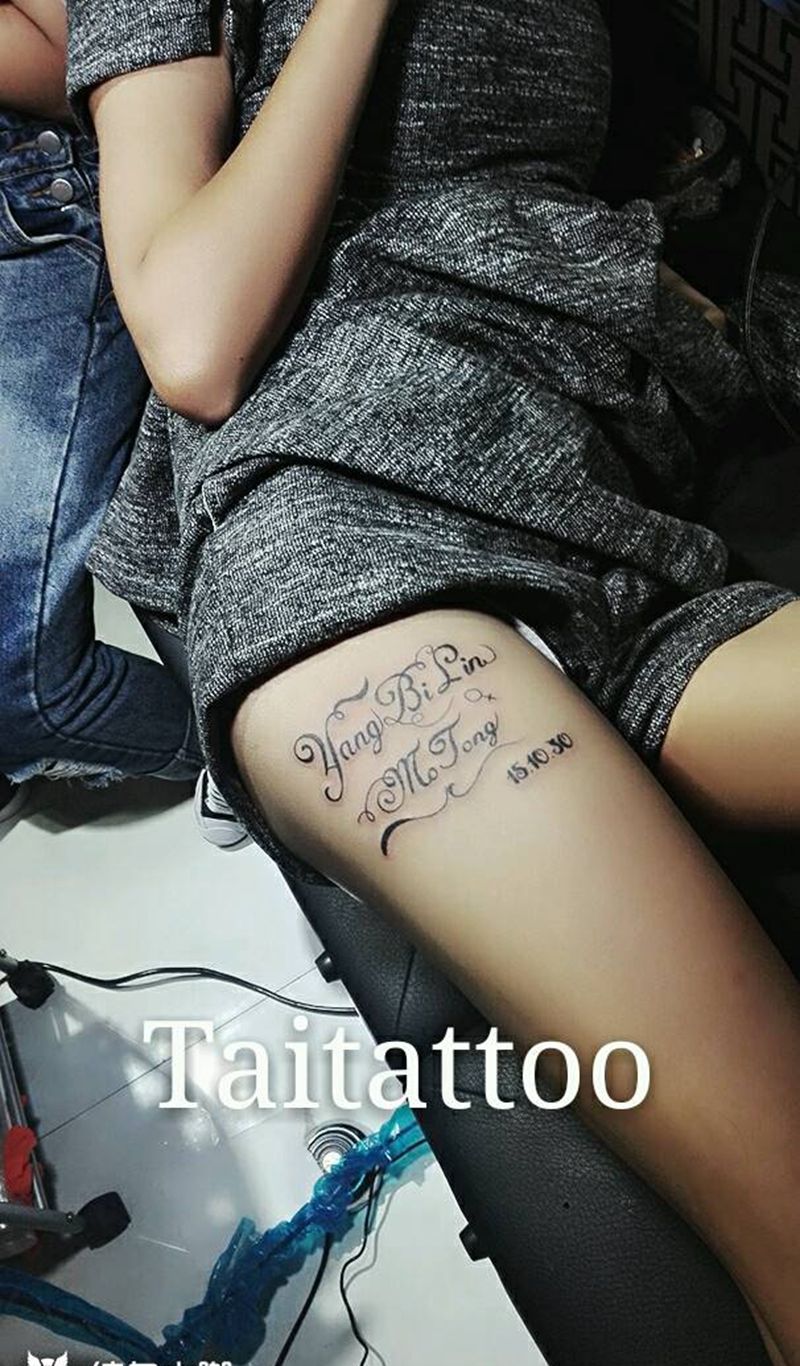 大腿字母纹身～傣刺青纹身图片