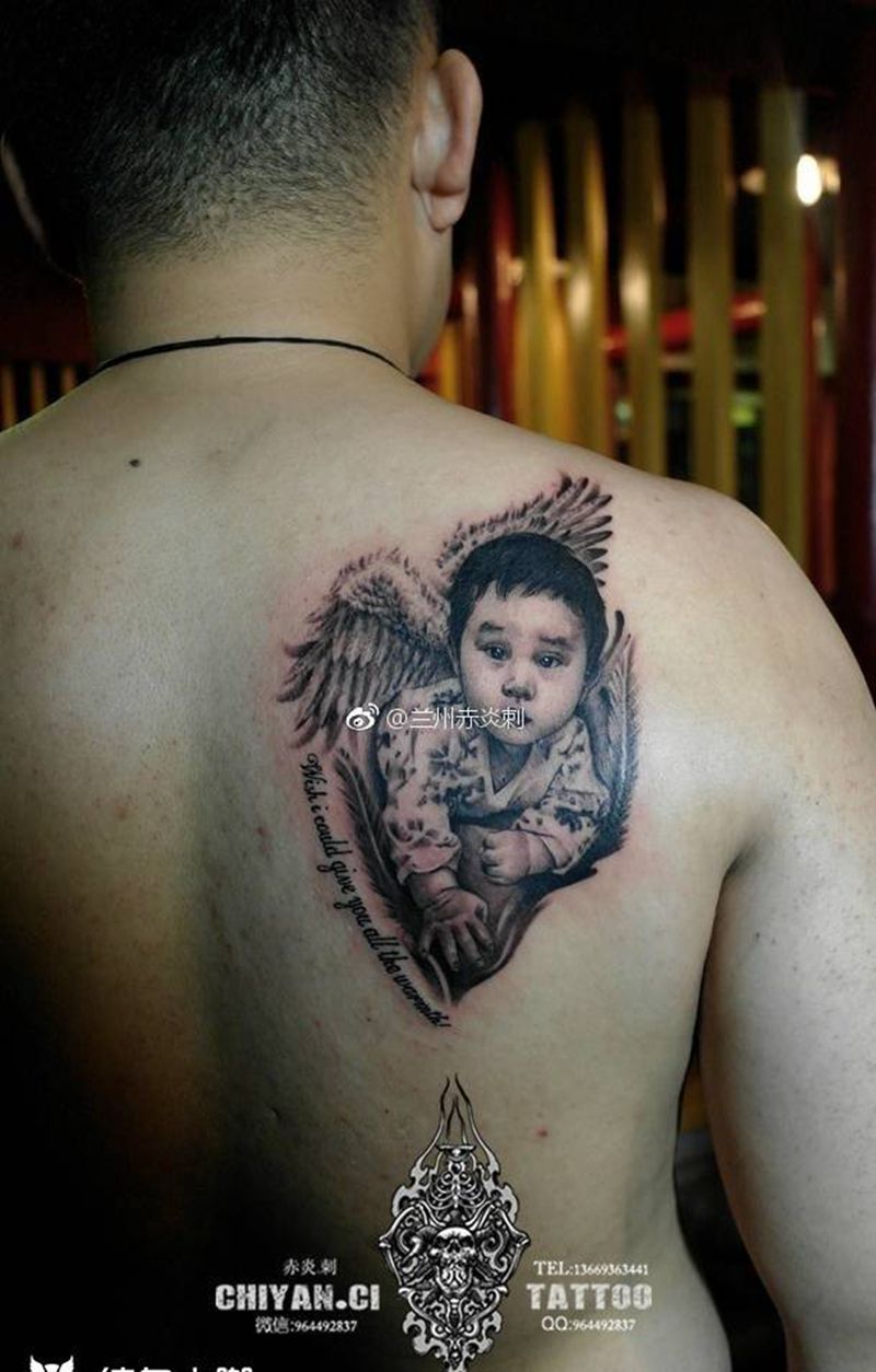 肖像纹身图片_成品背部肖像写实人物原创纹身图案