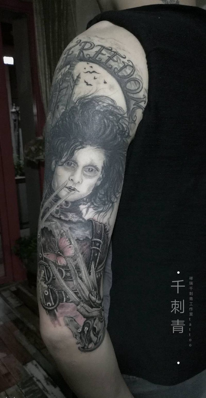 美发师爱德华纹身图片_手臂欧美写实旧图遮盖纹身图案
