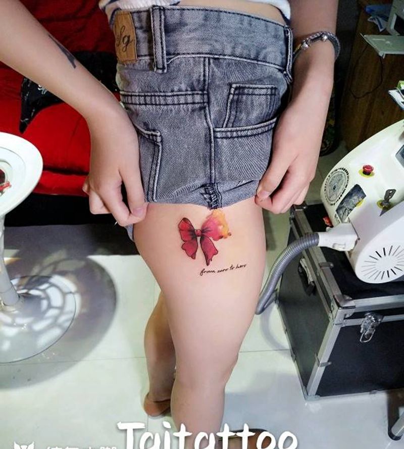 大腿蝴蝶结纹身~傣刺青作品纹身图片