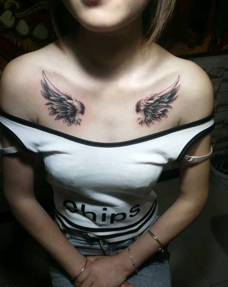 翅膀纹身图片_胸部纹身图案