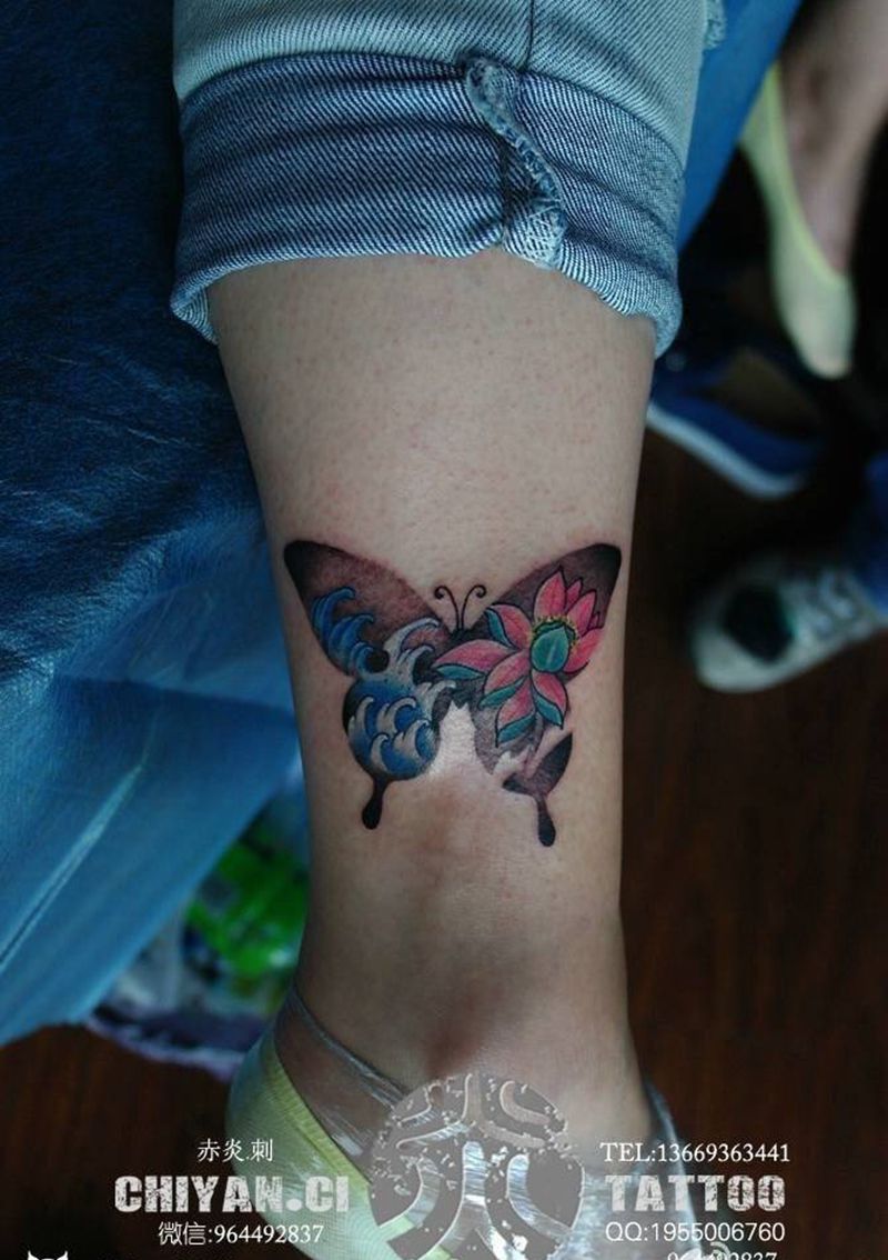 现画小图纹身图片_腿部成品传统清新动物植物纹身图案