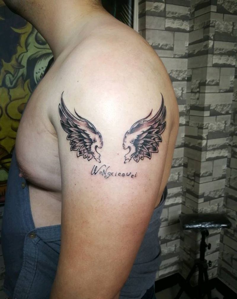 翅膀纹身图片_手臂纹身图案