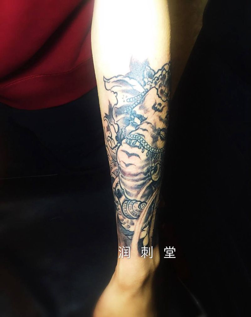 象神未完纹身图片