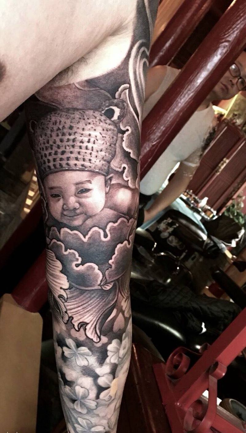 宝宝肖像，靳凯作品纹身图片_成品手臂肖像写实人物原创纹身图案