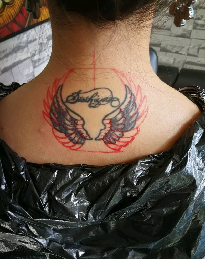 翅膀纹身图片_颈部纹身图案