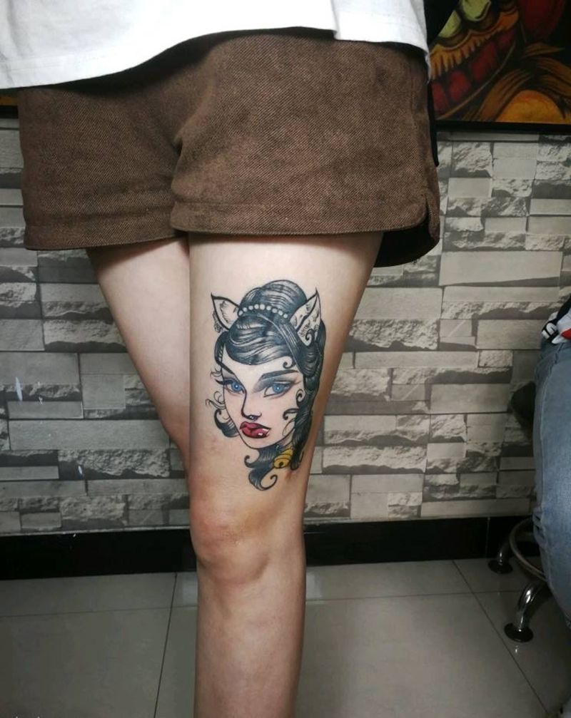 姑娘纹身图片_腿部纹身图案