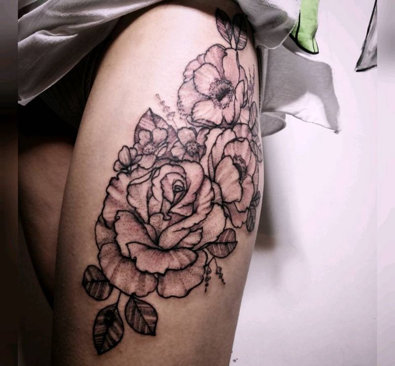 素花纹身图片_腿部点刺素花纹身图案