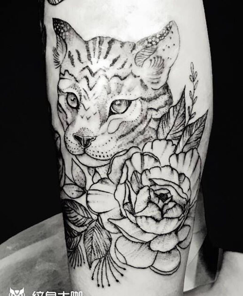 小腦斧纹身图片_腿部点刺纹身图案