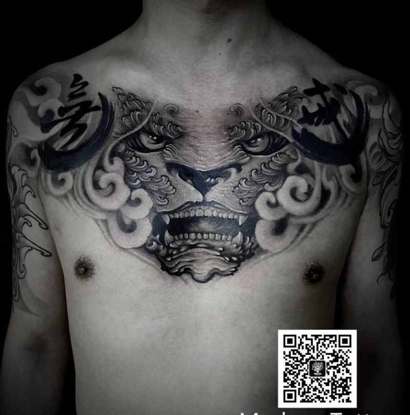 唐狮纹身图片_胸部纹身图案