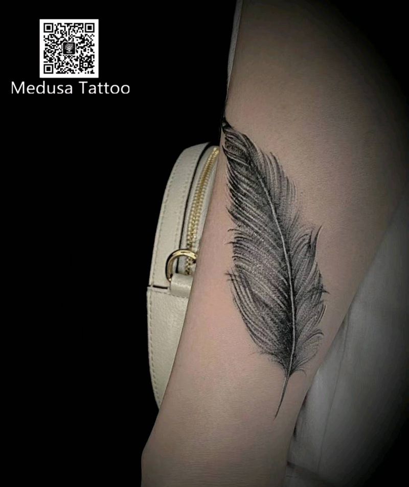 羽毛纹身图片_手臂纹身图案