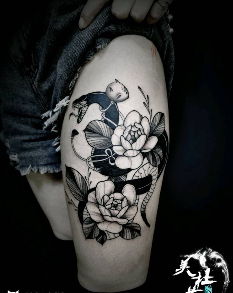 花与蛇纹身图片_腿部纹身图案