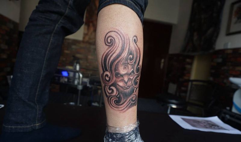 小腿斗战胜佛纹身图片