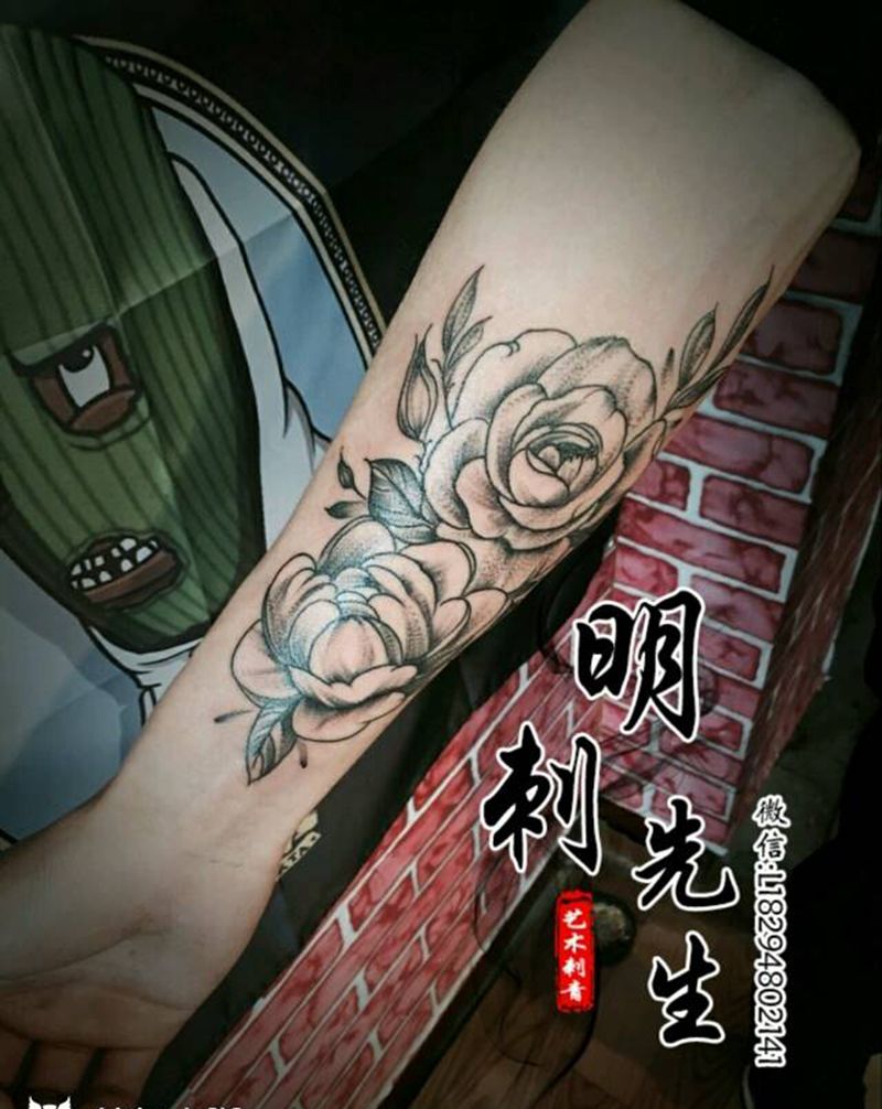 花纹身图片_手臂针痕纹身图案