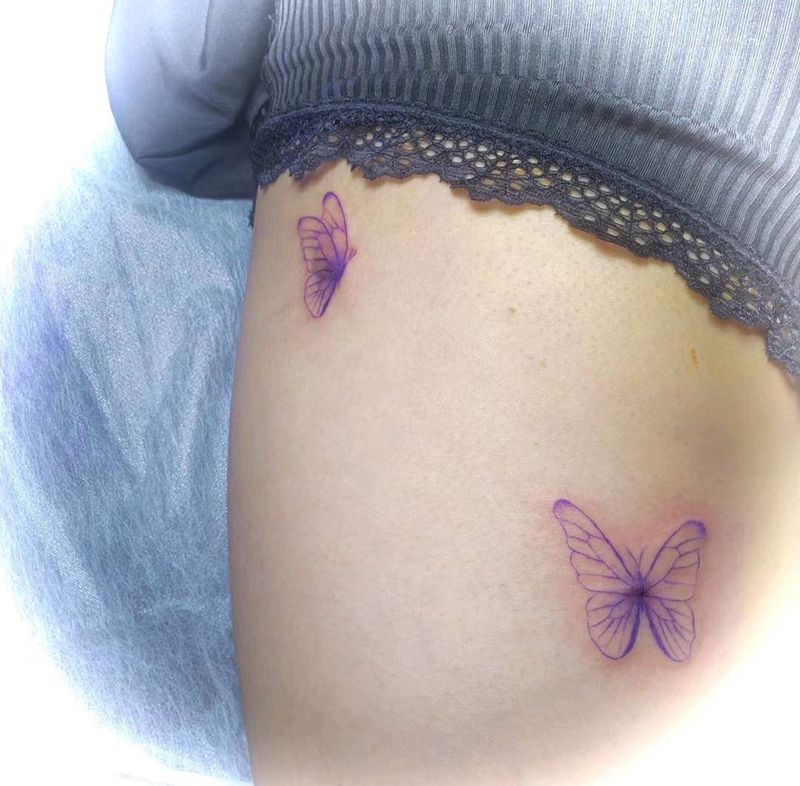 蝶纹身图片_腿部纹身图案