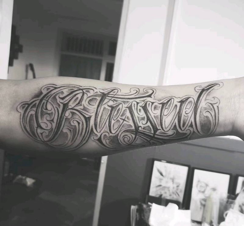 字纹身图片_手臂纹身图案