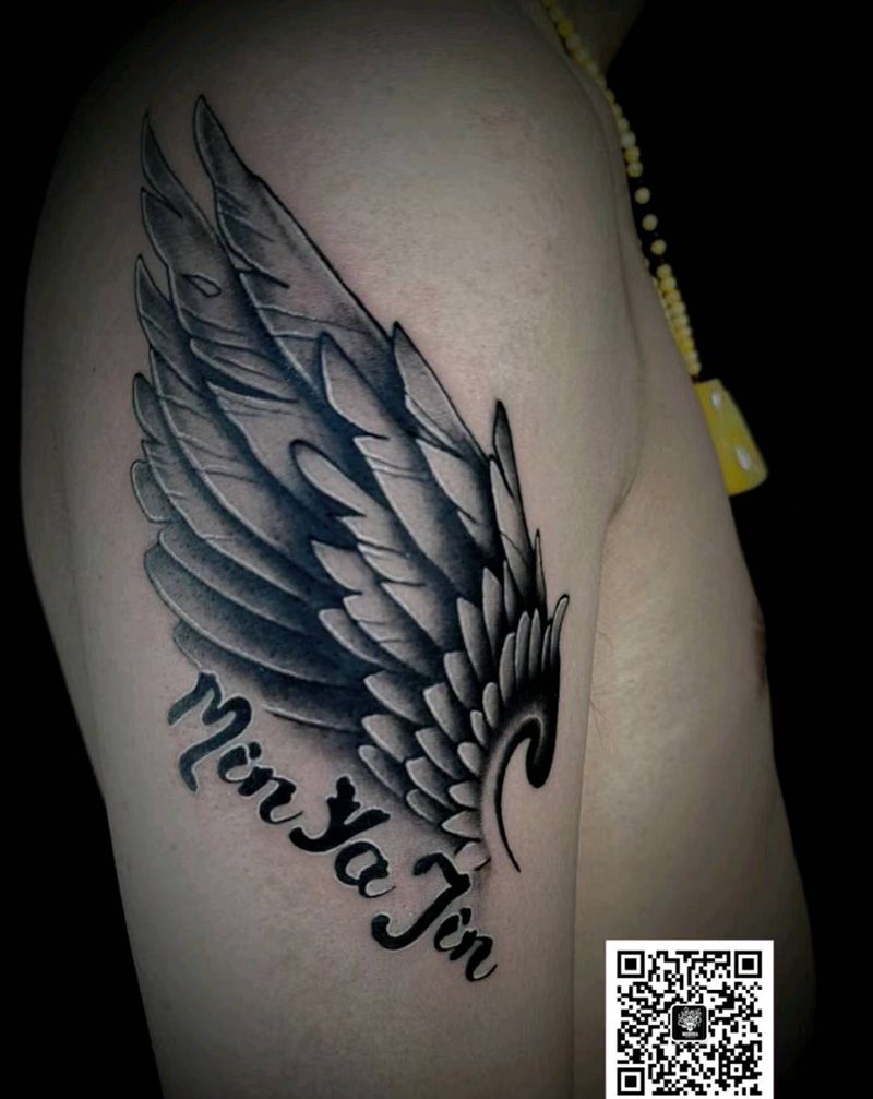 翅膀纹身图片_手臂欧美写实纹身图案