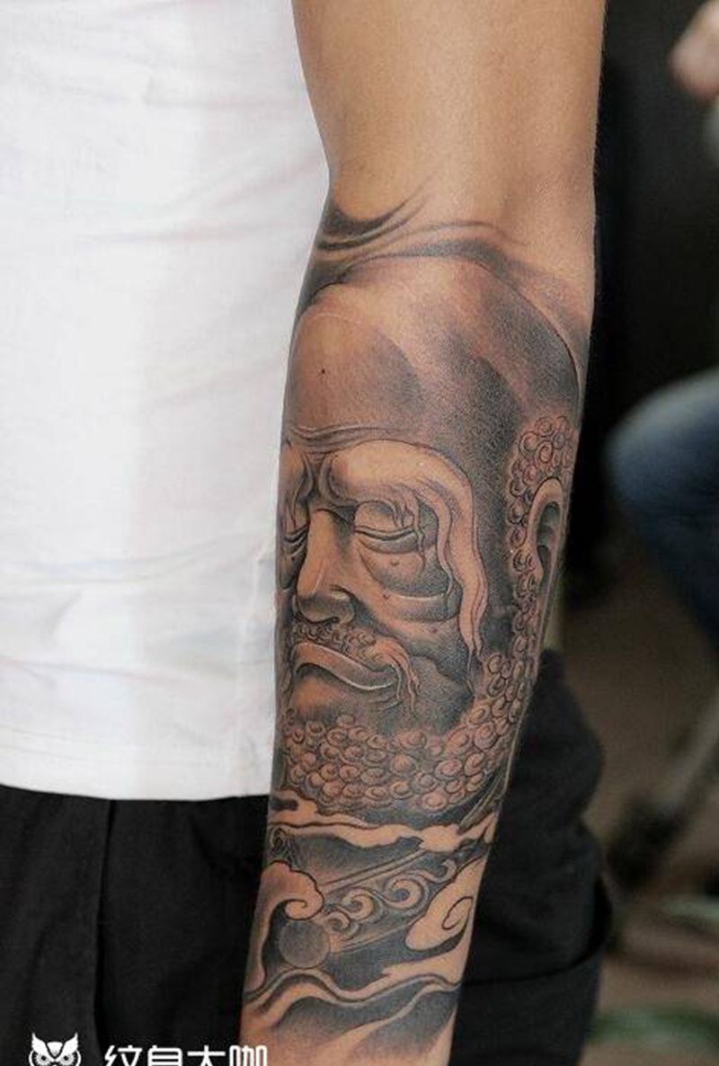 达摩包小臂纹身图片