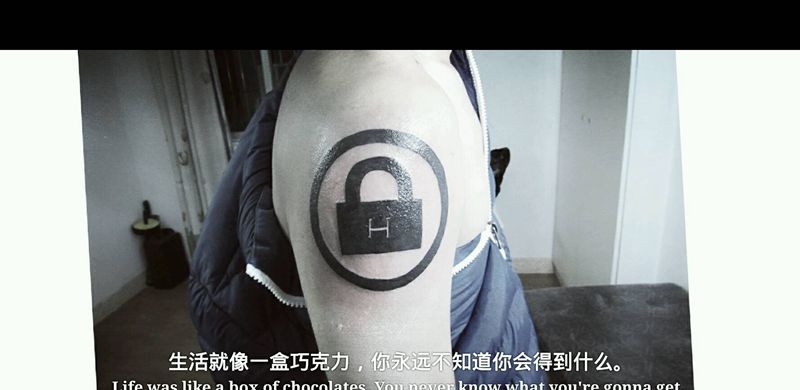 大臂图案纹身图片