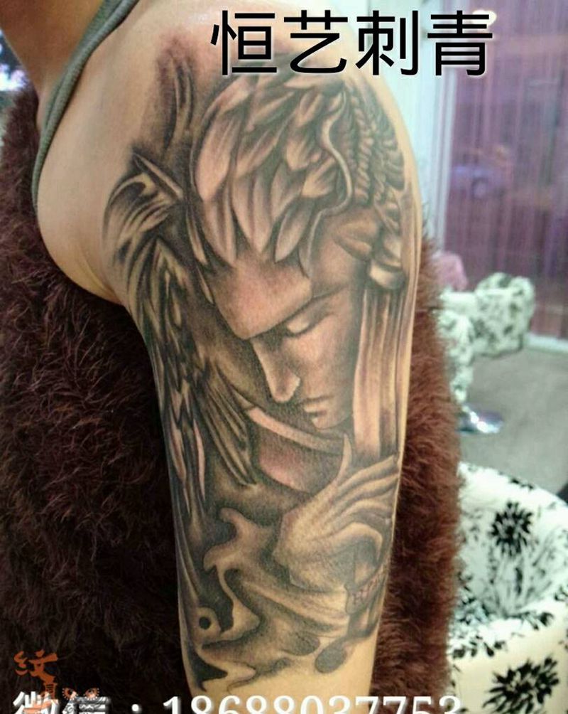 大臂欧美风纹身图片