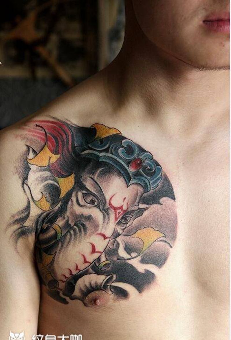 胸口象神纹身图片