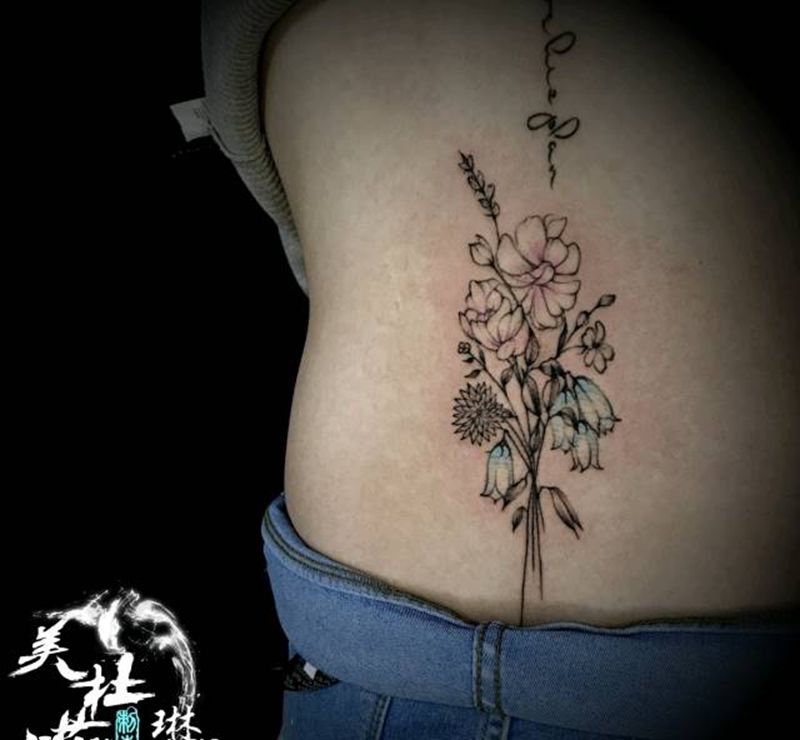 针痕花纹身图片_背部腰部针痕纹身图案