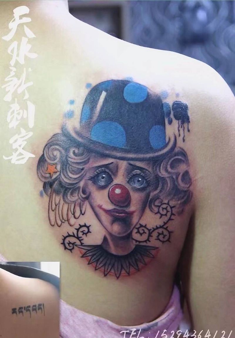 小丑遮盖纹身图片