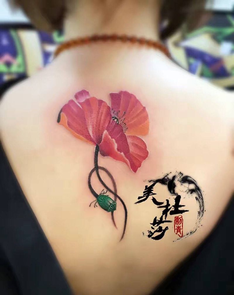罂粟花。纹身图片_成品背部清新植物纹身图案