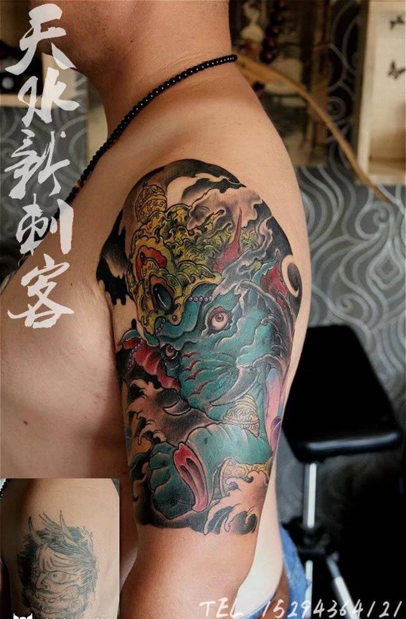 象神遮盖纹身图片
