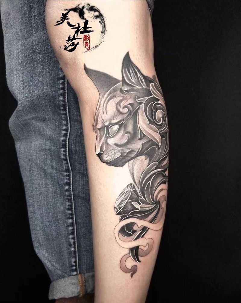 猫咪。纹身图片