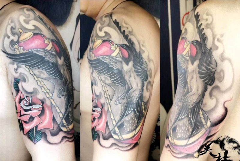 沙漏燕子纹身图片_手臂传统动物植物静物成品纹身图案