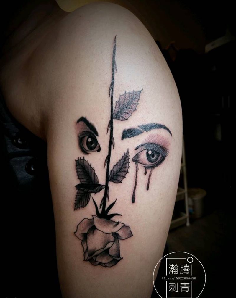 玫瑰眼睛纹身图片_手臂欧美写实几何玫瑰眼睛纹身图案